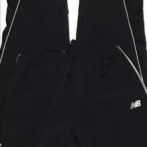 New balance men's wind pants with mesh trim Clearance